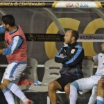 Uruguay’s Luis Suarez (L) reacts during